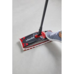 Detail of the foot-operated pedal on the Vileda Ultramax TURBO bucket for hands-free wringing.
